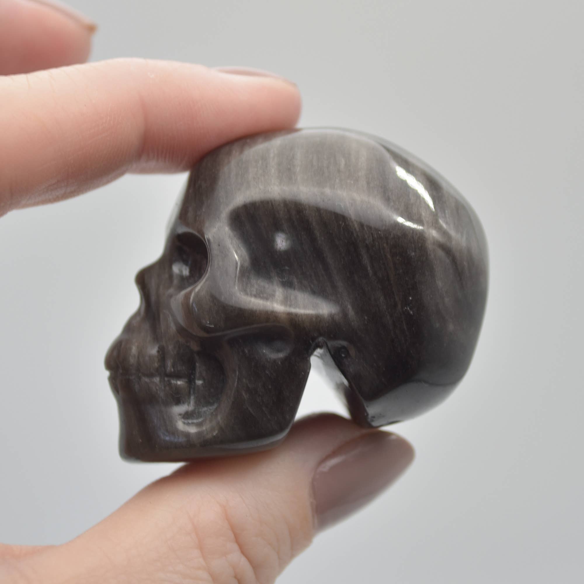 Zwart Zilveren Glans Obsidiaan Gesneden Schedelhoofd - 3,5 cm - 1 Stuk #01 voor groothandel op Faire5