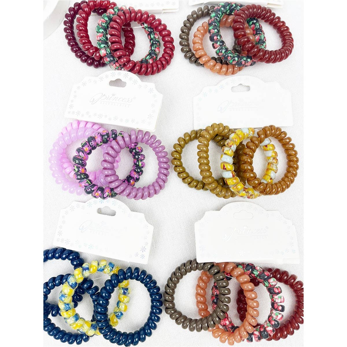 Print and Solid Mix Multi Design Spiral Hair Ties for wholesale on Faire2