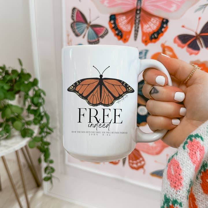 Free Indeed Monarch Butterfly Bible Verse 15oz Ceramic Mug for wholesale by Faith & Life Christian Brands