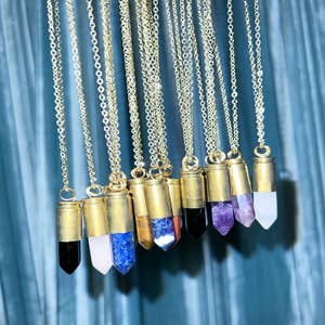 Purchase Wholesale bullet jewelry. Free Returns & Net 60 Terms on Faire