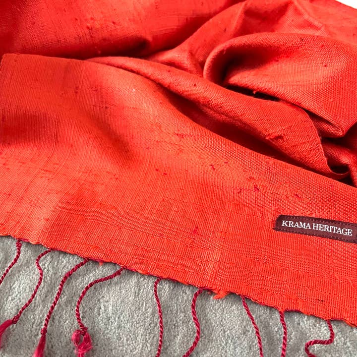 Krama Heritage - Wholesale Scarf - Women's - The Textured Orange Krama in its palm leaf case - Woman7