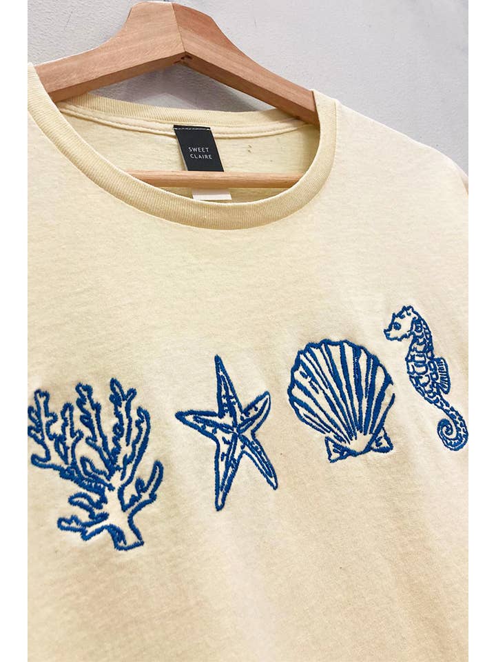 FRENCH VANILLA Embroidered Seashell Tee for wholesale on Faire1