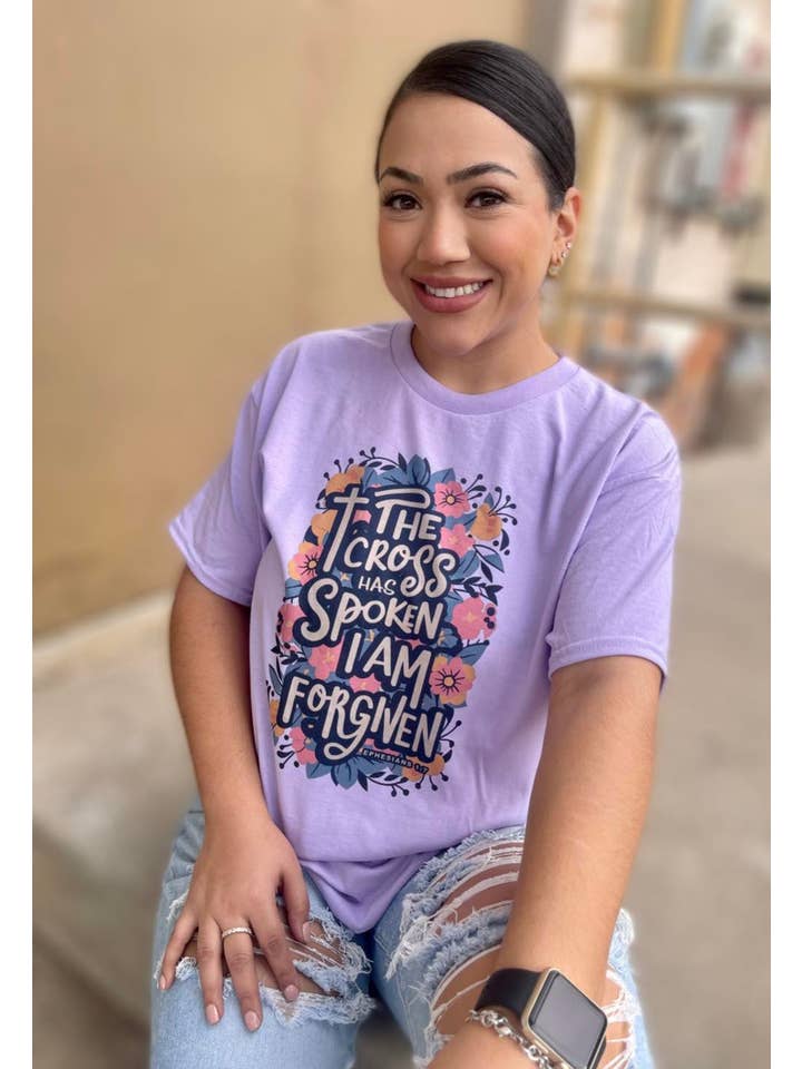Gildan Lilac The cross has spoken I am forgiven (T-Shirt) for wholesale on Faire