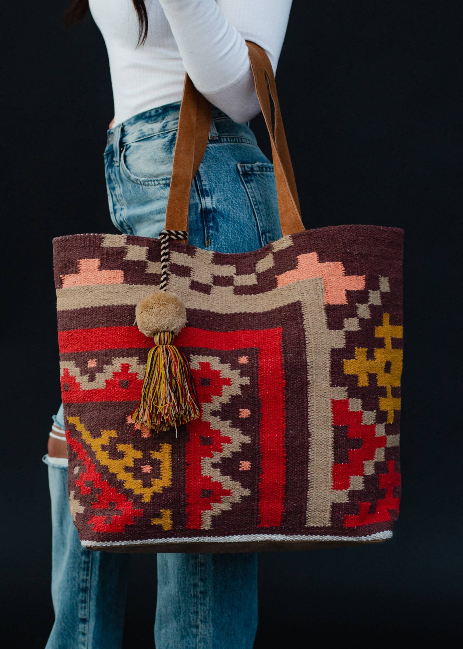 Buy Aztec Leather Tooled Cream and Black Wool Fringe Bag Online in India 