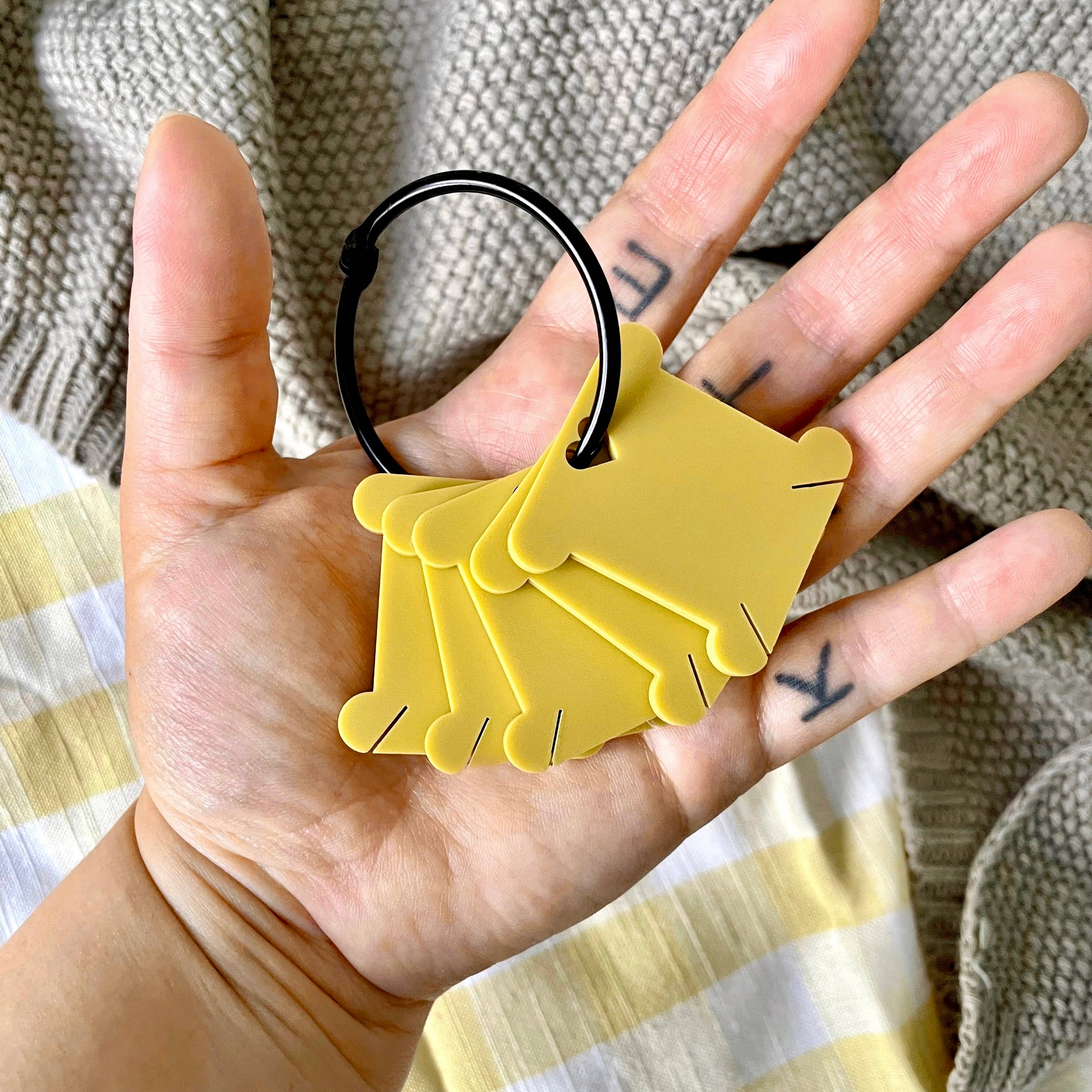 Kate Blandford – wholesale Embroidery/cross-stitch supplies – Acrylic bobbin set of 10 with cable ring5