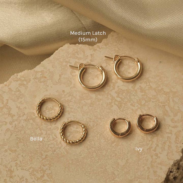 Gold Ivy Huggie Hoops for wholesale on Faire5