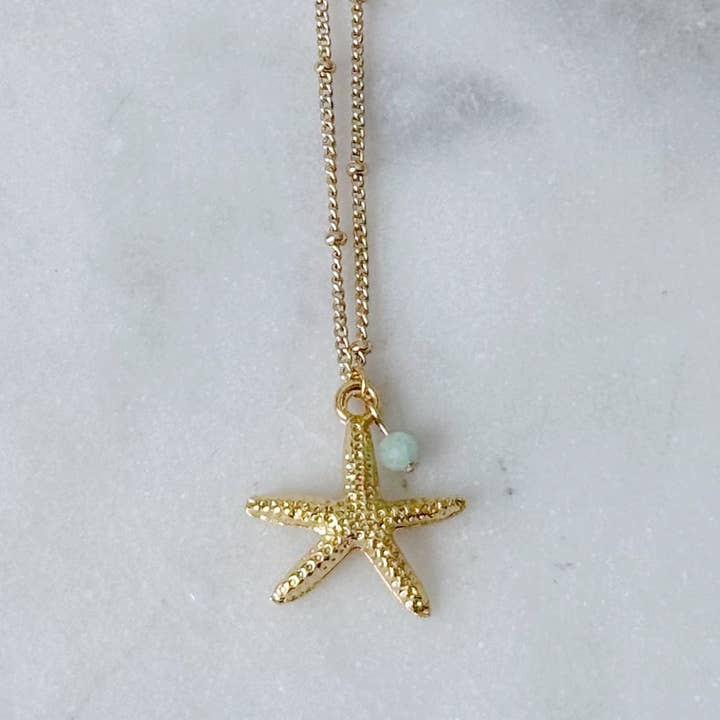 Gold starfish necklace for wholesale by Salt & June