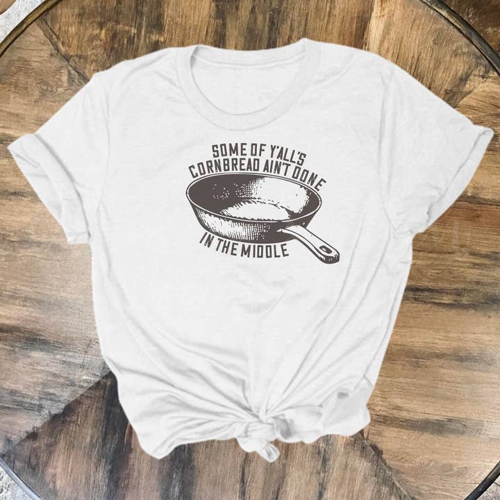 Chicken Scratch Design Co. - Wholesale T-Shirt (Graphic) - Women's - Some of Y'all's Cornbread Ain't Done in the Middle Tee