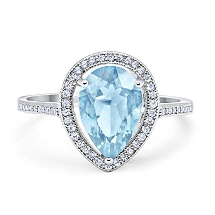 Halo Teardrop Pear Shape Aquamarine CZ Ring for wholesale by Blue Apple Imports