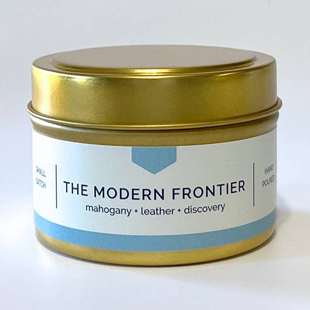 THE MODERN FRONTIER Gold Travel Tin Soy Candle - Mahogany + Leather, Hand-Poured (4 oz) - COLLAB for wholesale by Vacant Wheel