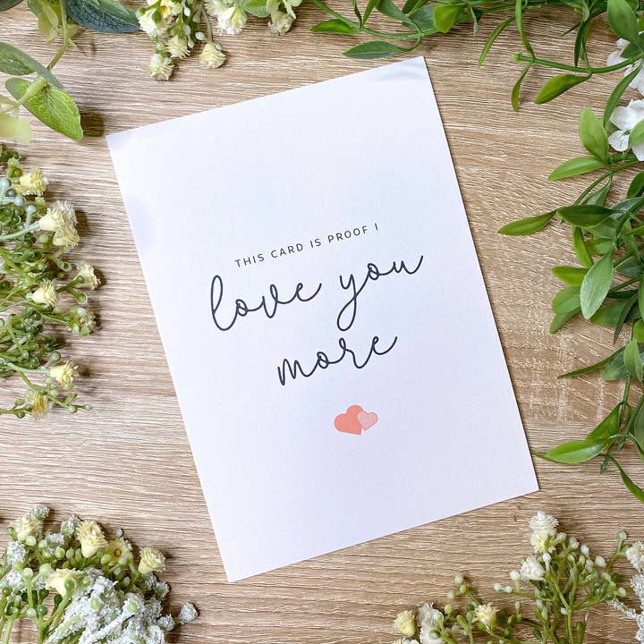 Love you more Valentines Anniversary Greeting Card for wholesale by Stottella Design