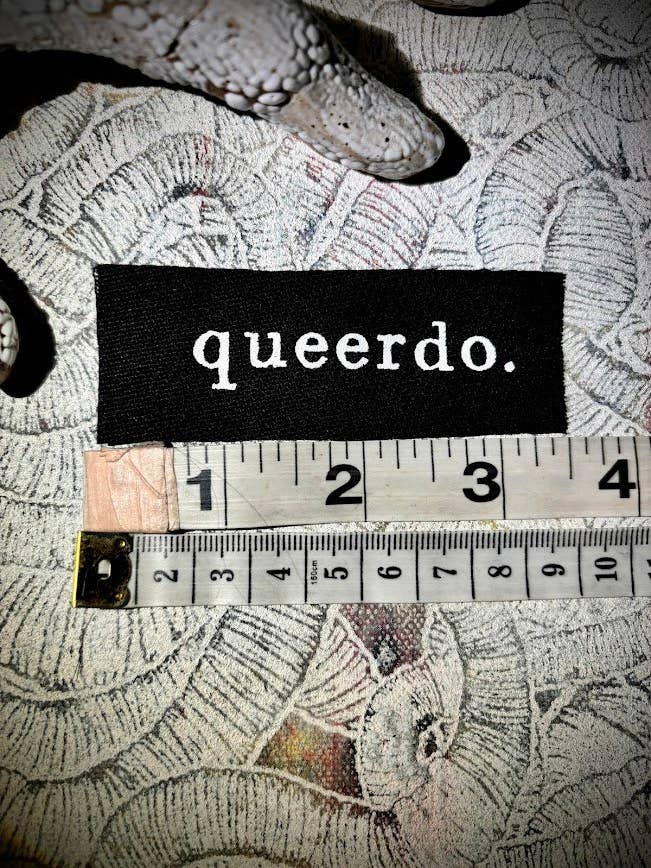 Queerdo tiny patch. for wholesale by Three Raccoons