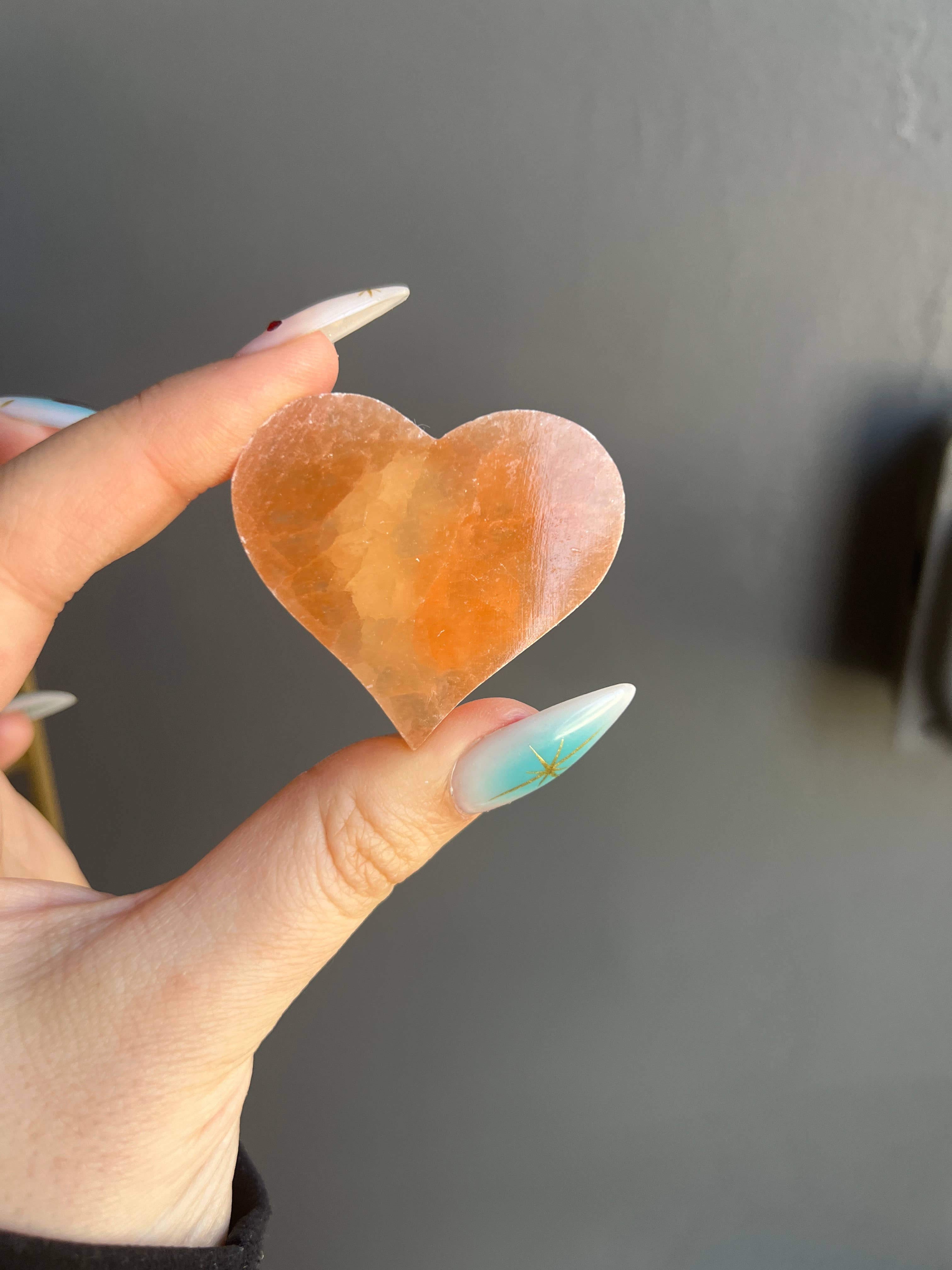 Sapphire & Sage - Wholesale Spiritual Stone/Crystal - Peach Selenite Etched Cat Crystal Heart Carving1