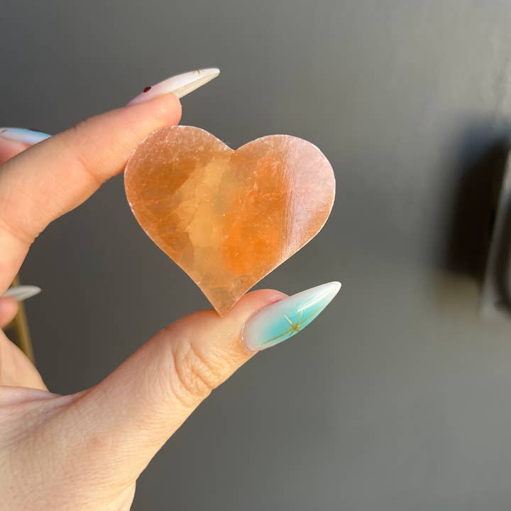 Sapphire & Sage - Wholesale Spiritual Stone/Crystal - Peach Selenite Etched Cat Crystal Heart Carving1