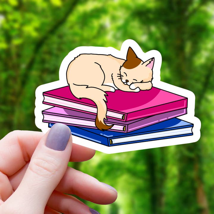Bisexual Pride Cat On Books Sticker - 3" for wholesale by Mimic Gaming Co
