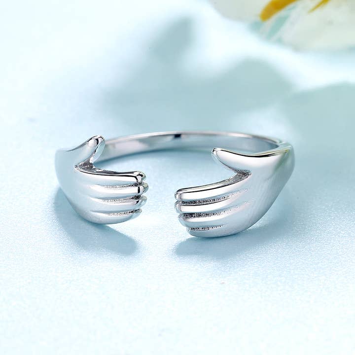 Amy and Annette - Wholesale Band/Stacked Ring - Sterling Silver Hugging Hands Adjustable Ring