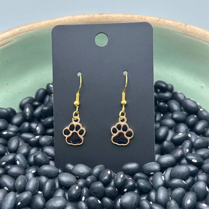 Black and Gold Paw Print Earrings for wholesale by Crooked Halo