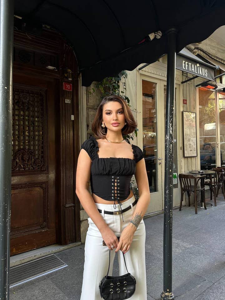 Standpoint Top - Wholesale Blouse - Women's - Ruffle-Trim Lace-Up Corset Top – 1106