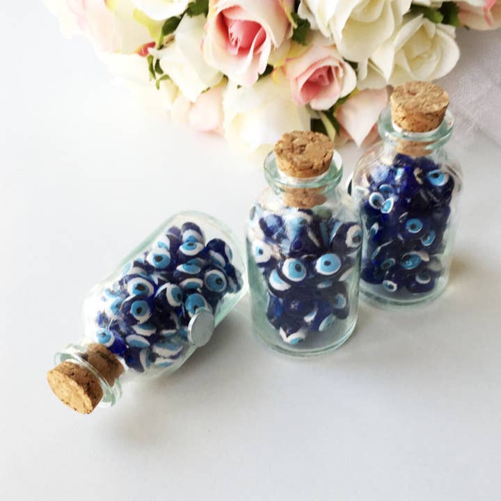 Evil eye bottle magnet, unique evil eye wedding favor, for wholesale by Evileyefavor