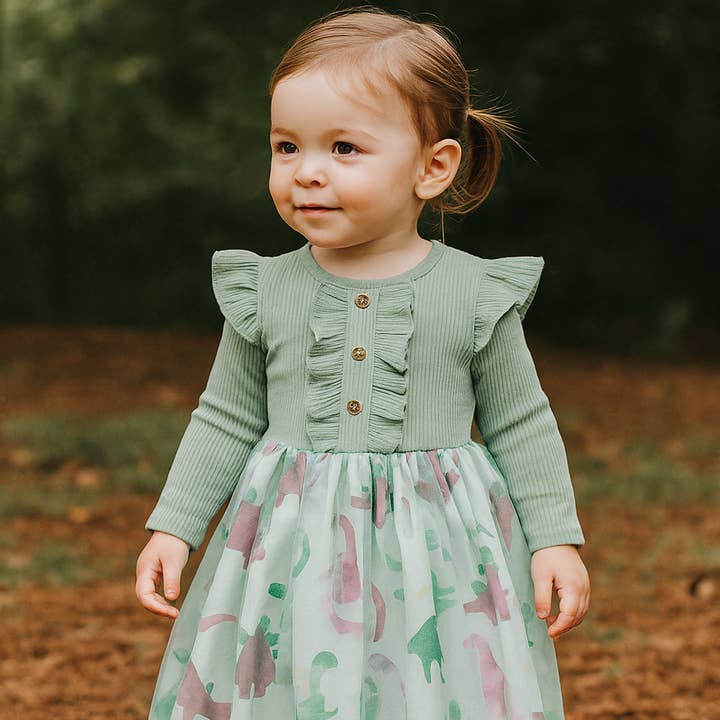 Vestido de Menina Verde Sálvia com Folhos e Estampa de Dinossauro por atacado de Fennco Styles