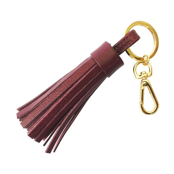 Porte-clés à pompon en cuir pour la vente par Stick & Ball