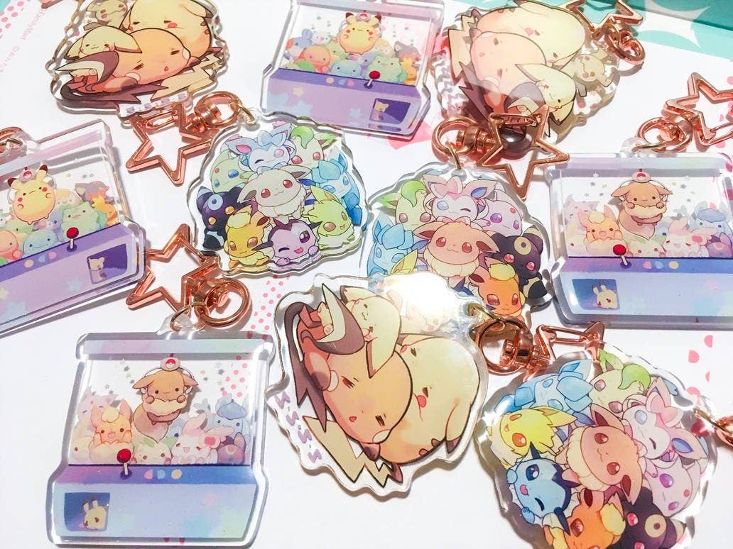 ToasterKiwi - Wholesale Keychain - Unisex - Pikachu Eevee Nintendo Switch Charms (2.5 inch Clear Acrylic)2