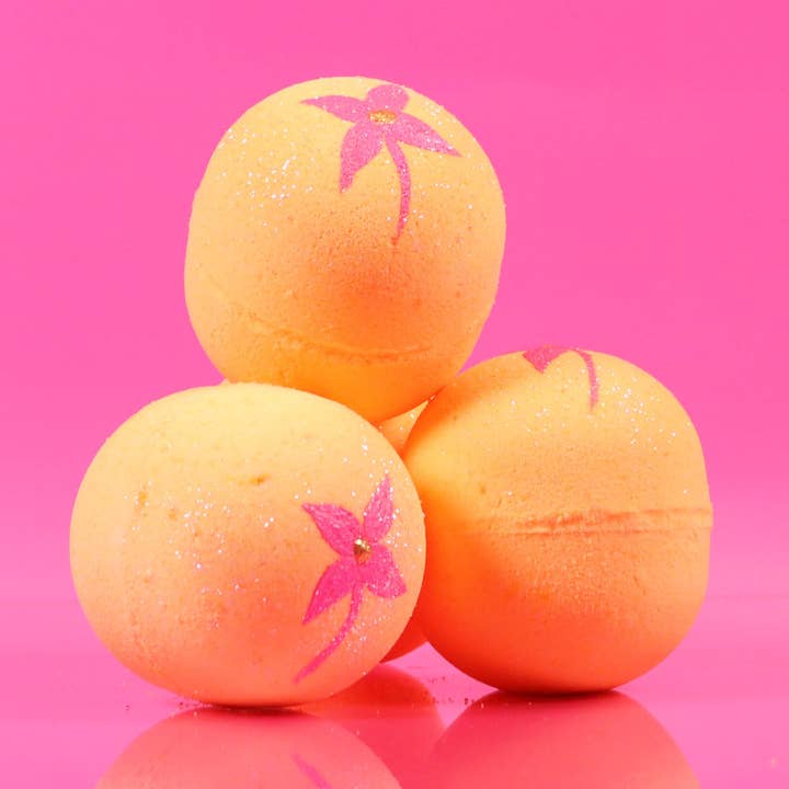 Peach Poppy Posie Bath Bomb for wholesale by Story Bath Bombs