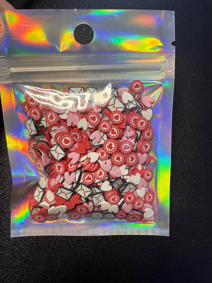 Love Letters Polymer Clay Slices 5mm. 0.5 oz bag for wholesale by ASAP Craft Supplies