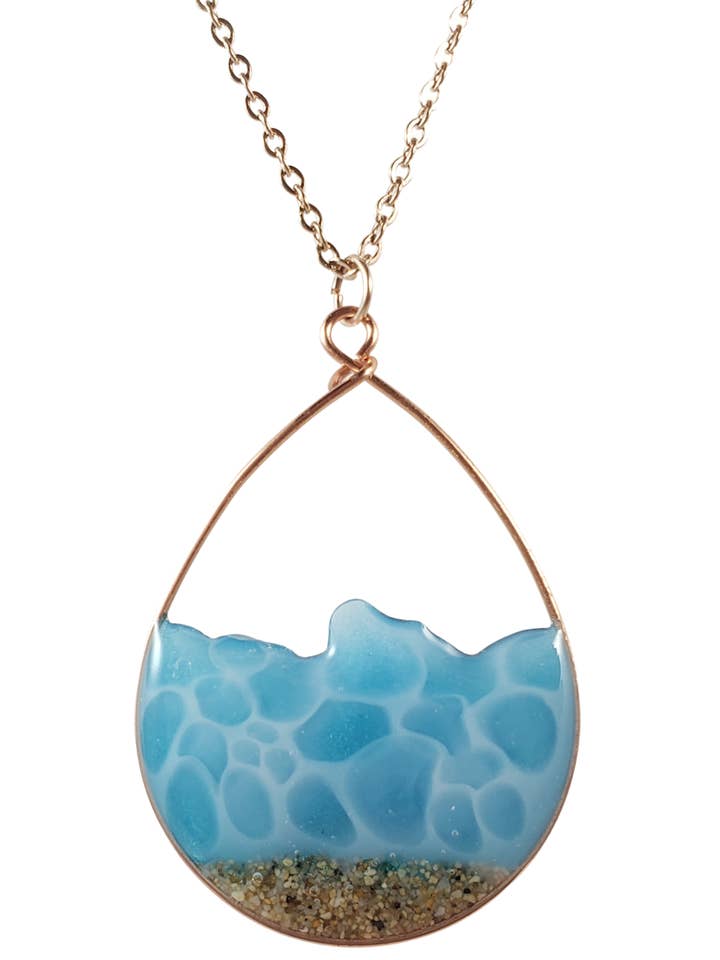 Blue seafoam water and sand necklace in rose gold for wholesale by Skinny Pig Designs