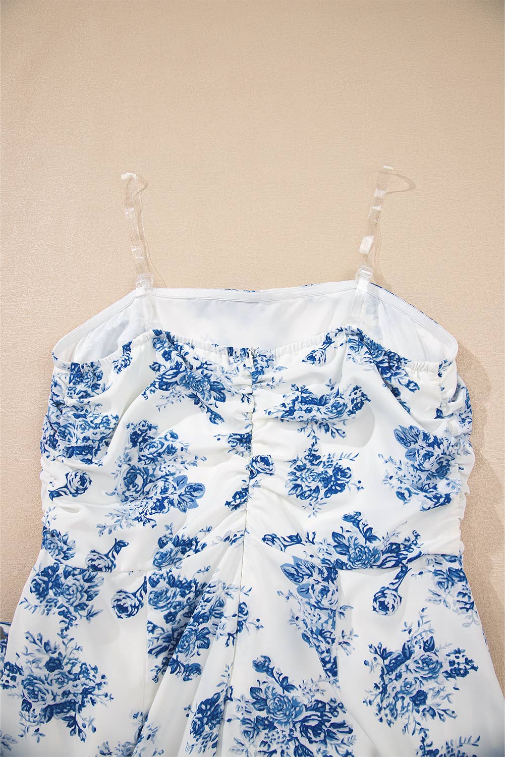 Blue Floral Print Strapless Zipped Back Knot Waist Ruffled Romper for wholesale on Faire7