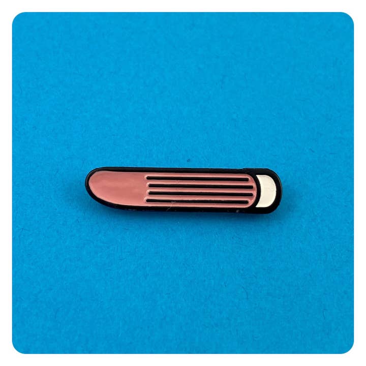 Vibrator Enamel Pin for wholesale by Ridin' High Productions