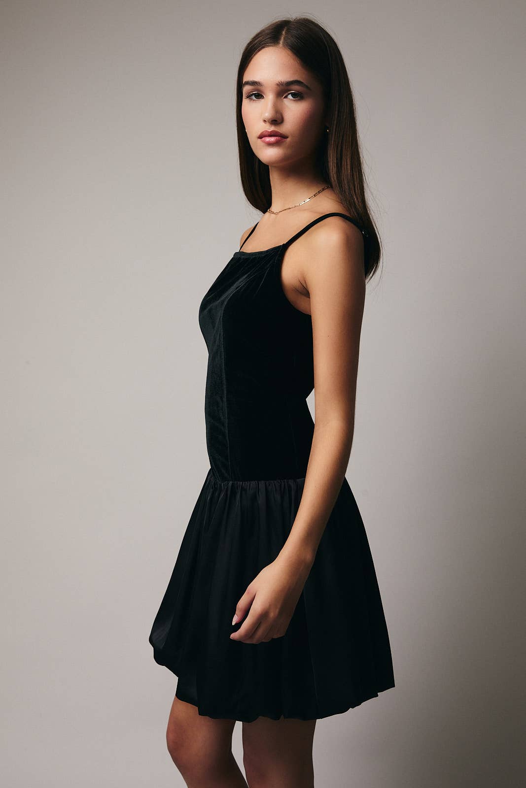Black SLEEVELESS DROP WAIST BUBBLE HEM DRESS for wholesale on Faire2