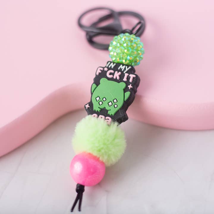 Groda J**la nyckelring för wholesale av Darling Doe Designs