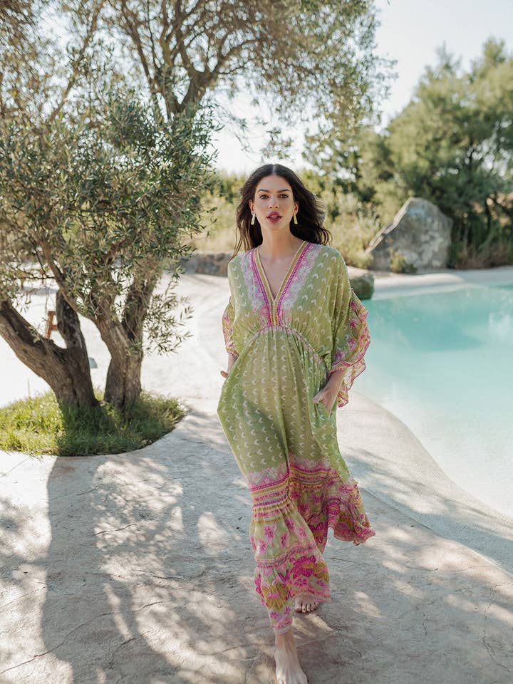 CURACAO GROENE JURK MET LANGE MOUWEN voor wholesale door Piti Cuiti