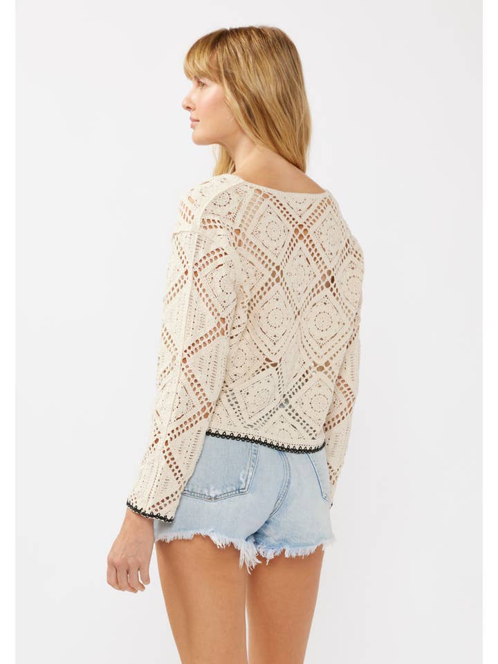 Natural Long Sleeve Diamond Floral Crochet Crop Top for wholesale on Faire