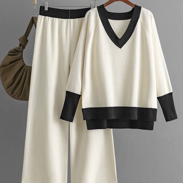 High-Low Contrast Color Split-Side V-Neck Sweater Tops + Elasticity Pants Trousers Two Pieces Set and other Purchase Wholesale one piece 108. Free Returns & Net 60 Terms on Faire trending on Faire.