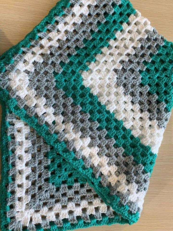 Handmade crochet adult turquoise, grey and white blanket for wholesale by Quirkyhickfords