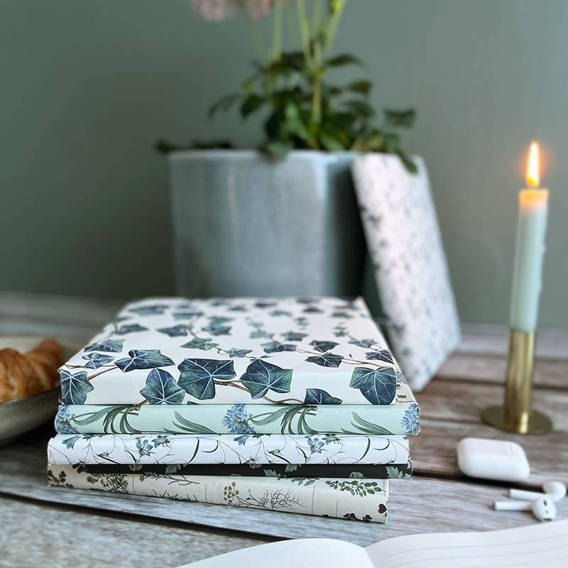 Koustrupco - Vendita all'ingrosso Carta da regalo in fogli - Confezione regalo 4 fiori stagionali 4 fogli di carta riciclata1