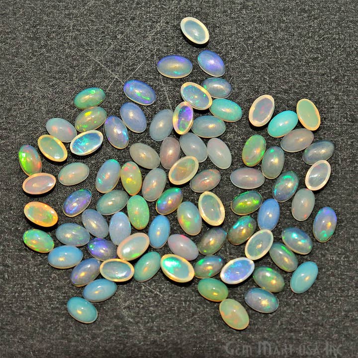 Opali Etiopi Gemme Sciolte Ovali Cabochon 5x3 mm, Confezione da 10 per la vendita all'ingrosso da parte di GemMartUSA