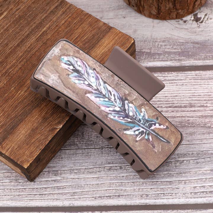 TYPE FEATHER PRINT LEATHER HAIR CLAW CLIPS WESTERN_CWAHA0602 for wholesale on Faire