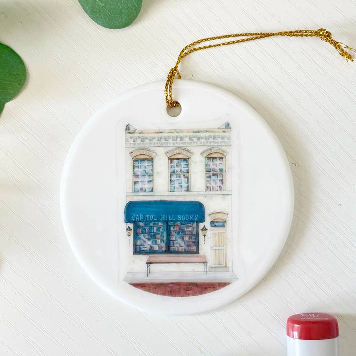 Capitol Hill Books | White Ceramic Ornament with Gold Tassel for wholesale by D. Prince Designs