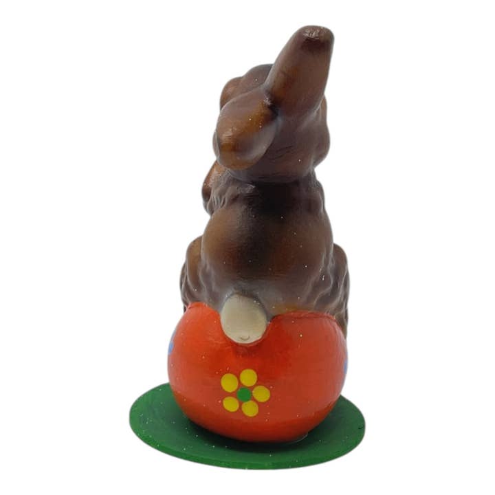 Pinnacle Peak Trading - Wholesale Decorative Figurine - Ino Schaller Easter Bunny on Orange Egg German Paper Mache