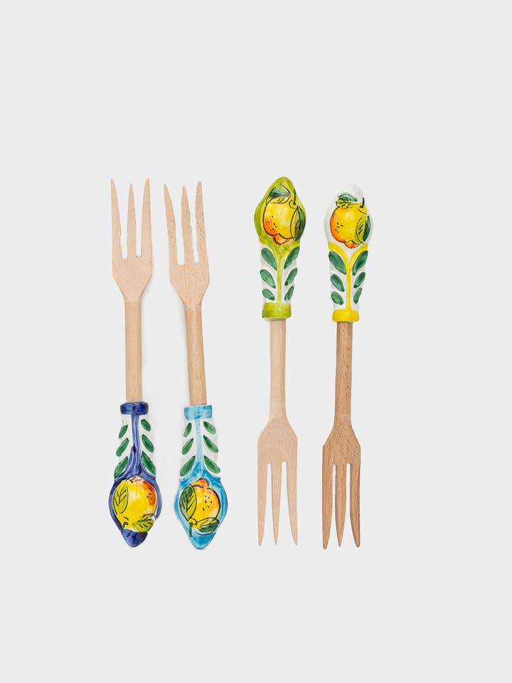 Pair of wooden/ceramic cutlery for wholesale by Teorema Mediterraneo