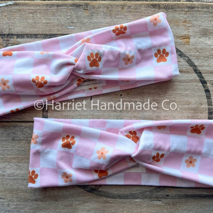 Stretchy Twist Headband – Pink & Orange Paw Print Checker for wholesale by Harriet Handmade Co.