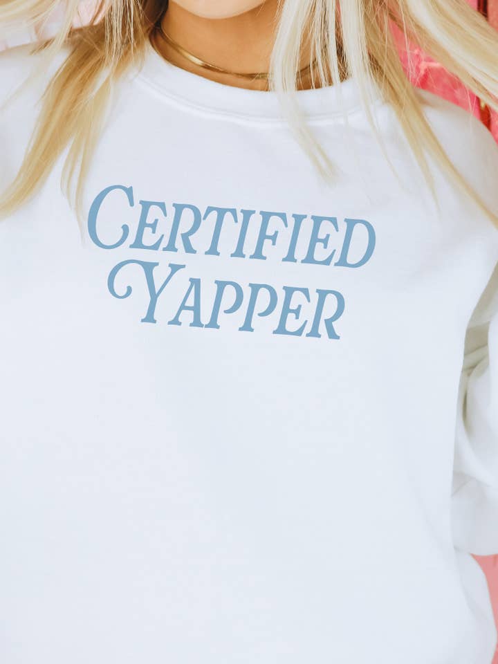 Certified Yapper Adult Graphic Crewneck Pullover and other Purchase Wholesale pep rally pullover. Free Returns & Net 60 Terms on Faire trending on Faire.