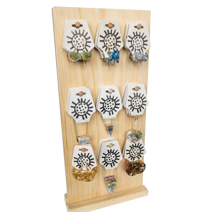 Lot de colliers et boucles d'oreilles en résine écologique pour la vente par Belart Fair Trade