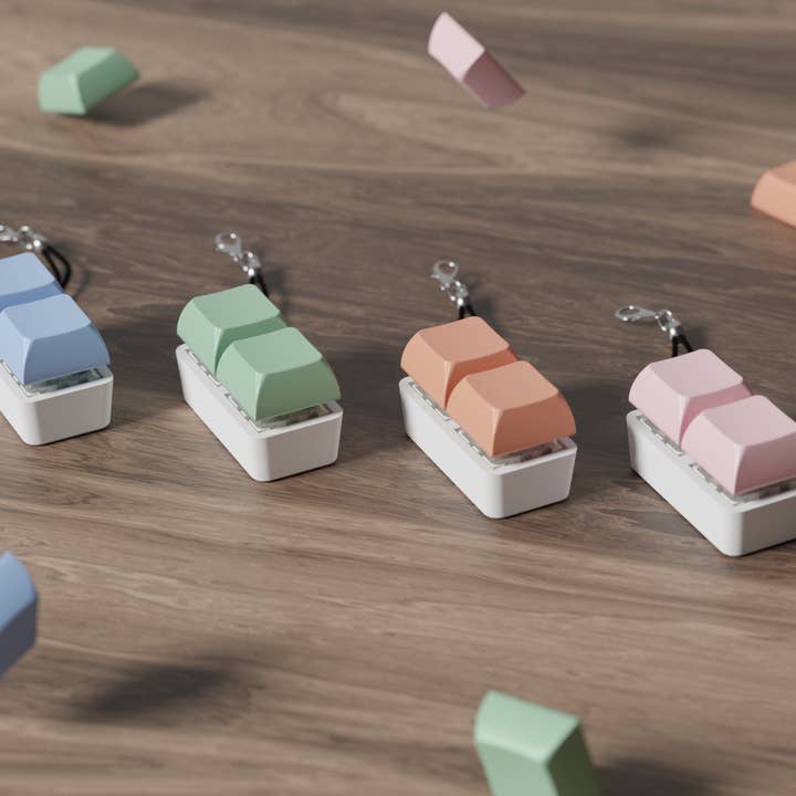 Strudel3D - Wholesale Fidget Toy - Kids - 2x1 Mechanical Fidget Keychain - Pastel Colors