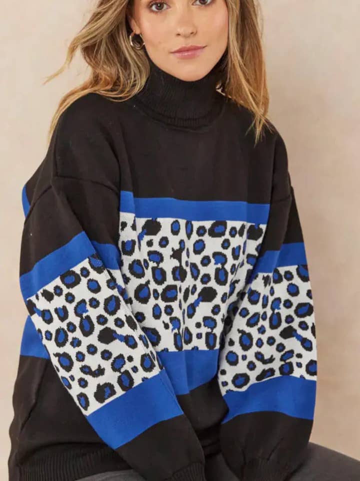 Pull à col montant pour la vente par Patrick Joseph