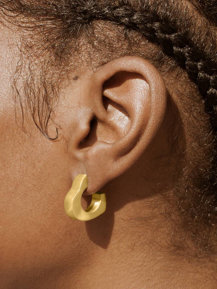 Golden Heart Dangle Earrings for wholesale by RIIA