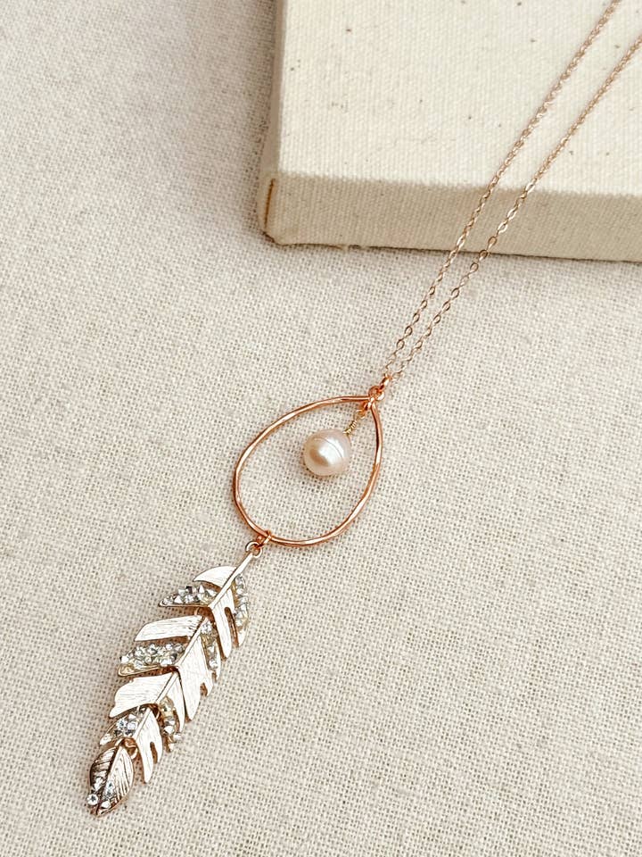 Rose Gold Feather Pendant Necklace with Rhinestones & Pearl for wholesale by Gracie Rose Designs